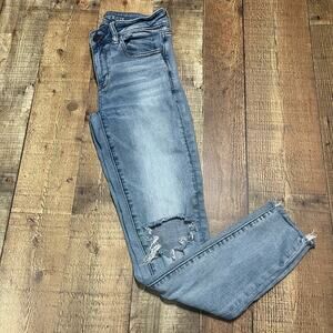 American Eagle | Women's Distressed Raw Hem Super Stretch Denim Jegging Sz 4